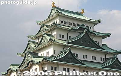 Closeup of castle tower, with shachihoko on top. Nagoya Castle is famous for its golden pair of shachihoko roof ornaments. During the Aichi Expo in 2005, they were taken down for public display. 天守閣
Keywords: aichi prefecture nagoya castle