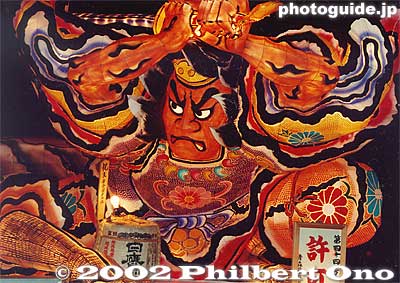 According to one story, the Nebuta has its roots in the 8th century.
According to one story, the Nebuta has its roots in the 8th century when there was a rebellion in Ezo (Hokkaido). Ordered by Emperor Kanmu to quell the rebellion, generalissmo Sakanoue no Tamuramaro went to Ezo. However, he failed to capture the elusive chief of Ezo who went into hiding in the mountains.

Sakanoue then set up a trap with large votive lanterns which were lit and accompanied by taiko drums and flutes. This lured the curious Ezo chief out of hiding and led to his capture. The large lanterns were the forerunner of the Nebuta.
Keywords: aomori nebuta matsuri8 festival float lantern japansculpture