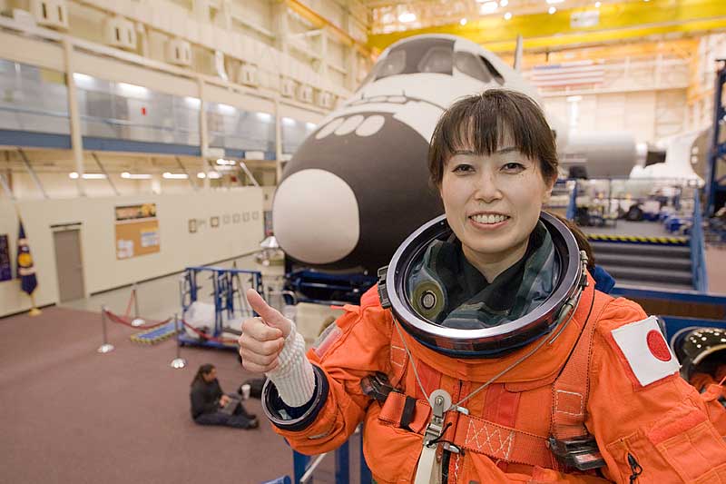 29 Jan. 2010 --- Naoko Yamazaki, attired in a training version of her shuttle launch and entry suit, poses for a photo prior to the start of an ingress/egress training session...
29 Jan. 2010 --- Japan Aerospace Exploration Agency (JAXA) astronaut Naoko Yamazaki, STS-131 mission specialist, attired in a training version of her shuttle launch and entry suit, poses for a photo prior to the start of an ingress/egress training session in the Space Vehicle Mock-up Facility at NASA's Johnson Space Center.
