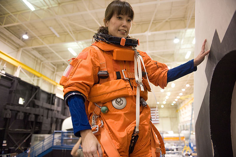 14 Sept. 2009 --- Naoko Yamazaki, attired in a training version of her shuttle launch and entry suit, participates in a training session...
14 Sept. 2009 --- Japan Aerospace Exploration Agency (JAXA) astronaut Naoko Yamazaki, STS-131 mission specialist, attired in a training version of her shuttle launch and entry suit, participates in a training session near one of the full-scale trainers in the Space Vehicle Mock-up Facility at NASA's Johnson Space Center.
