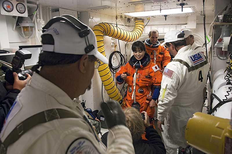2010 March 5 --- For the Terminal Countdown Demonstration Test, Naoko Yamazaki is about to board Space Shuttle Discovery.

