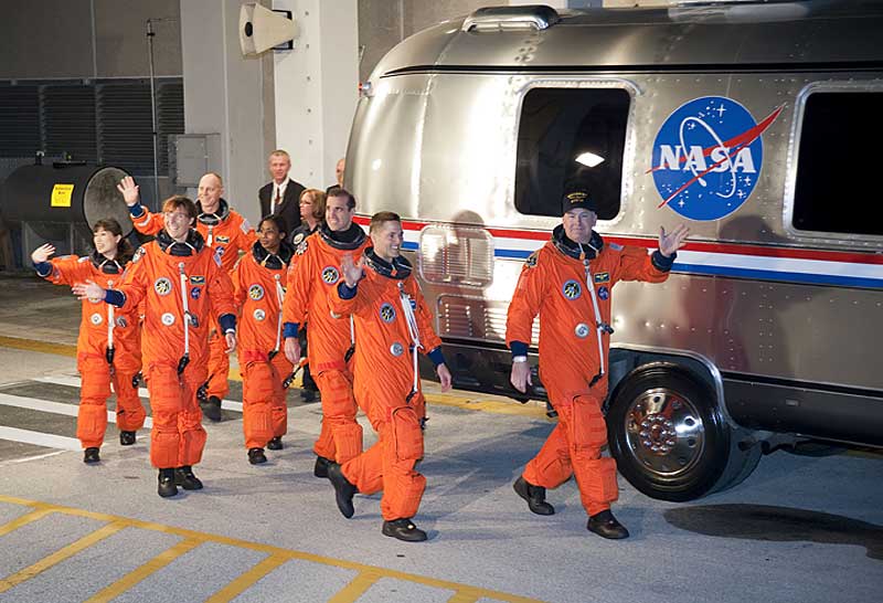 5 April 2010 --- After suiting up, the STS-131 crew members exit the Operations and Checkout Building to board the Astrovan, which will take them to launch pad 39A for the launch of space shuttle Discovery on the STS-131 mission. On the right (front to back) are NASA astronauts Alan Poindexter, commander; Rick Mastracchio, Stephanie Wilson and Clayton Anderson, all mission specialists. On the left (front to back) are NASA astronauts James P. Dutton Jr., pilot; Dorothy Metcalf-Lindenburger, and Japan Aerospace Exploration Agency (JAXA) astronaut Naoko Yamazaki, both mission specialists. Liftoff of the STS-131 mission is set for 6:21 a.m. (EDT) on April 5. On STS-131, the seven-member crew will deliver the multi-purpose logistics module Leonardo, filled with supplies, a new crew sleeping quarters and science racks that will be transferred to the International Space Station's laboratories. The crew also will switch out a gyroscope on the station's truss structure, install a spare ammonia storage tank and retrieve a Japanese experiment from the station's exterior. STS-131 is the 33rd shuttle mission to the station and the 131st shuttle mission overall.
