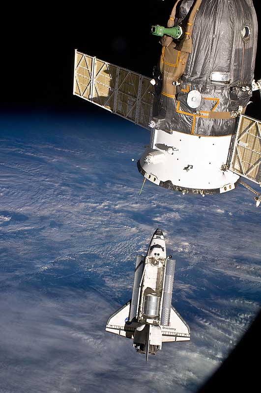 Sapce Shuttle Discovery approaches the International Space Station.
