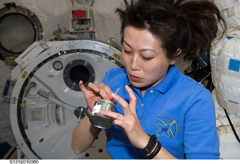 14 April 2010 --- Naoko Yamazaki, STS-131 mission specialist, eats a snack in the Kibo laboratory...
14 April 2010 --- Japan Aerospace Exploration Agency (JAXA) astronaut Naoko Yamazaki, STS-131 mission specialist, eats a snack in the Kibo laboratory of the International Space Station while space shuttle Discovery remains docked with the station.
