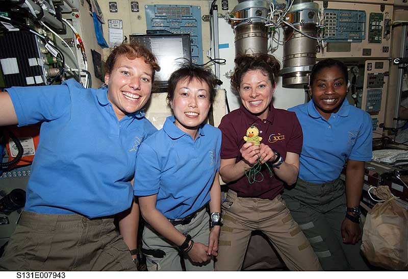 7 April 2010 --- For the first time, four women were in space.
7 April 2010 --- The four women currently on the International Space Station pose for a photo in the Zvezda Service Module while space shuttle Discovery remains docked with the station. From the left are NASA astronaut Dorothy Metcalf-Lindenburger and Japan Aerospace Exploration Agency (JAXA) astronaut Naoko Yamazaki, both STS-131 mission specialists; along with NASA astronauts Tracy Caldwell Dyson, Expedition 23 flight engineer; and Stephanie Wilson, STS-131 mission specialist.
