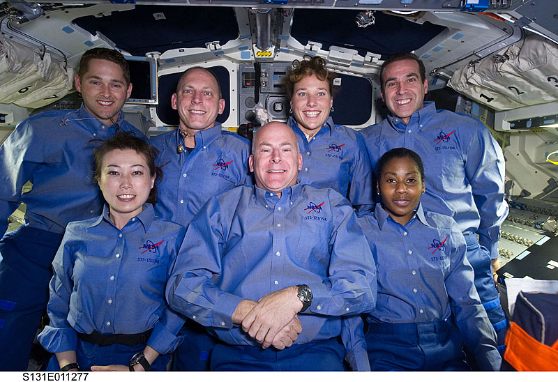 18 April 2010 --- The STS-131 crew members pose for an in-flight portrait on the aft flight deck of the Earth-orbiting space shuttle Discovery...
18 April 2010 --- The STS-131 crew members pose for an in-flight portrait on the aft flight deck of the Earth-orbiting space shuttle Discovery. Pictured on the front row are NASA astronaut Alan Poindexter, commander; Japan Aerospace Exploration Agency (JAXA) astronaut Naoko Yamazaki (left) and NASA astronaut Stephanie Wilson, both mission specialists. Pictured from the left (back row) are NASA astronauts James P. Dutton Jr., pilot; Clayton Anderson, Dorothy Metcalf-Lindenburger and Rick Mastracchio, all mission specialists.
