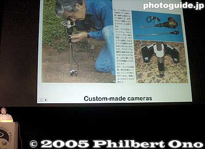 Sept. 11, 2005: The third photographer I introduced was insect photographer Satoshi Kuribayashi who lives in Nagasaki Prefecture. He is an award-winning photographer who has published numerous photo books in Japan.　僕のスライドショーその３
The third photographer I introduced was insect photographer Satoshi Kuribayashi who lives in Nagasaki Prefecture. He is an award-winning photographer who has published numerous photo books for the public and children in Japan.

I knew that insect photography was not so popular in Finland, but I believed that this photographer's work and technique would be very interesting to people in Finland, so I asked him to send some pictures and books to me. He happily obliged.

As I expected, his pictures (and DVD movie) were very well received by the audience in Kuusamo. First I showed some of his extreme closeup pictures of insects, then a few pictures of his custom-made cameras and him at work (as you see here). For the remaining 9 minutes of the slide show, I showed his fantastic DVD movie of insects. 

Sample photos:
[url=http://www5.ocn.ne.jp/~kuriken/html/japan/gallery1photo3.html]Migratory locust[/url]
[url=http://www5.ocn.ne.jp/~kuriken/html/japan/g5digitalphoto6.html]Melon fly[/url]
[url=http://www5.ocn.ne.jp/~kuriken/html/japan/g6digitalphoto5.html]Camponotus japonicus ant[/url]
[url=http://www5.ocn.ne.jp/~kuriken/html/japan/g5digitalphoto3.html]Tiger beetle[/url]
[url=http://www5.ocn.ne.jp/~kuriken/html/japan/gallery2photo2.html]Beetle in flight[/url]

His Web site: [url=http://www5.ocn.ne.jp/~kuriken/]http://www5.ocn.ne.jp/~kuriken/[/url]

最後に、栗林 慧先生の昆虫写真作品と興味深い手作りのカメラやその仕事ぶりを紹介してDVDの動画も一部上映しました。これもとても好評でした。北欧では昆虫写真はあまり人気ではないが、栗林先生の作品を見たら皆さんの関心が集めました。予想とおりでした。やはり昆虫も面白い。
Keywords: Finland Kuusamo nature photo