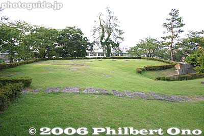 Top of castle tower foundation. Grassy, but uneven ground.
Keywords: fukui castle moat stone wall