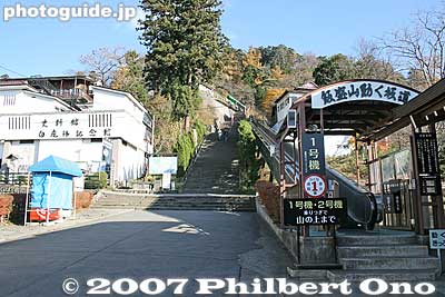 The Byakkotai were outnumbered and forced to retreat. Twenty of them escaped to Iimoriyama Hill where they saw what looked liked a burning Tsurugajo Castle. Photo: Pay a small fee to take the escalator up the hill. Or climb up the steps for free.
Keywords: fukushima aizu-wakamatsu iimoriyama hill byakkotai white tiger graves tombs memorial