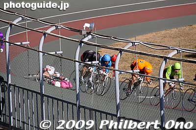 Two cyclists apparently collided and took a spill.
Keywords: gifu ogaki bicycle racetrack cycling stadium keirin 