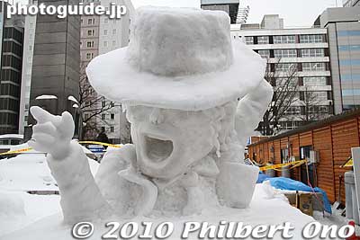 Michael Jackson snow sculpture at the 2010 Sapporo Snow Festival. Coiled wiring is used for the hair dangling below his hat.
Keywords: hokkaido sapporo snow festival ice sculptures matsuri2