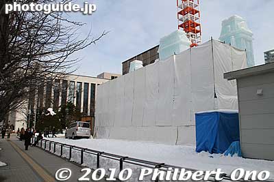 Rear view of the Iolani Palace ice sculpture. Scaffolding propped up colored lights.
Keywords: hokkaido sapporo snow festival iolani palace ice sculpture 