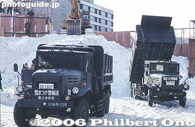 Now some photos of the 1982 Sapporo Snow Festival. This was when they built Iolani Palace out of snow (not ice). These are army trucks hauling in snow to the Odori Park site in early Jan.
Keywords: hokkaido sapporo snow festival
