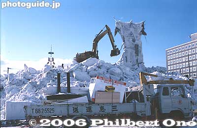 Each giant snow sculpture becomes a pile of snowy rubble.
Keywords: hokkaido sapporo snow festival