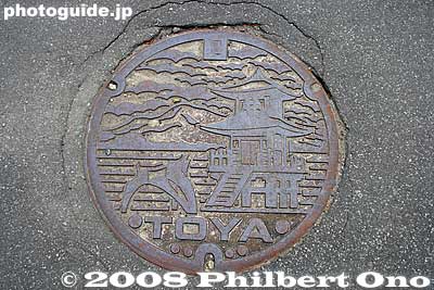 Toya manhole showing the Ukimido temple and Nakajima islands. Hokkaido
Keywords: hokkaido toyako-cho onsen hot spring spa lake toya manhole