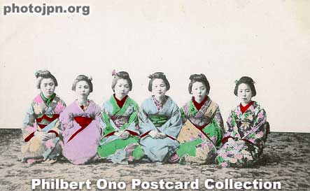 Brothel maids or prostitutes. Maids were employed to guide patrons to their rooms and serve sake and food. Or they could be low-class (cheap) prostitutes. Hand-colored, undivided back.
Keywords: japanese vintage postcards nihon bijin women beauty geisha maiko woman kimono oiran prostitute