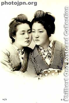 Cheek-to-Cheek. One of my favorite postcards. I wonder if they were sisters. Real-photo postcard with no divided back. The actual card is more yellowed, but I bleached it with Photoshop.
Keywords: japanese vintage postcards nihon bijin women beauty kimono