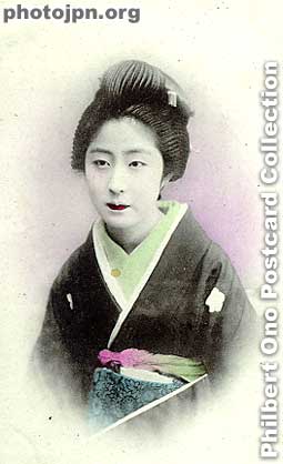 Japanese Beauty. I would call this a representative example of a "Nihon Bijin" or Japanese Beauty photograph. She's posed formally, dressed in a kimono, and looking serene and attractive. She might bJe a geisha. Hand-colored, and undivided b
I bought it for 1,200 yen.
Keywords: japanese vintage postcards nihon bijin women beauty kimono