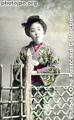 Girl at fence. Her posture is crooked, but somehow this photo looks nice. She's not sensationally attractive, but she's photogenic and comes across well. She also appears in the preceding postcard.
Keywords: japanese vintage postcards nihon bijin women woman beauty kimono flowers