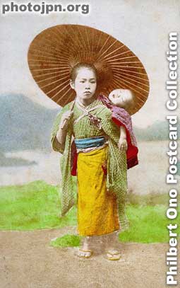Baby Baby Sitter. Such scenes were common in those days. Mom and dad were both busy farming, leaving the baby in the hands of older children. Hand-colored.
Keywords: japanese vintage old postcards children baby babies