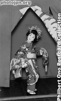 Girl on stage. Postcard-size photograph. Date is unknown.
Keywords: japanese vintage old postcards children girls dancer kimono