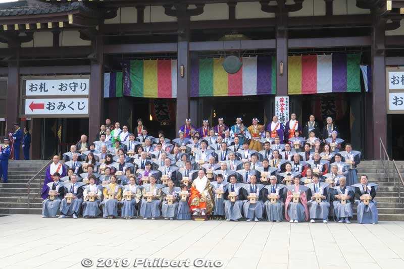 After the religious ceremony, group photo of the priests (head priest in the middle wearing orange) and bean throwers. 
Keywords: kanagawa kawasaki shingon-shu daishi Buddhist temple setsubun