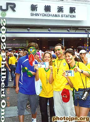 The final match of the 2002 World Cup was held in Yokohama on June 30, 2002. The closest train station to the stadium was Shin-Yokohama Station. Happy Brazil supporters show off their tickets to the World Cup final.
Keywords: world cup soccer game yokohama 2002 fans brazil germany
