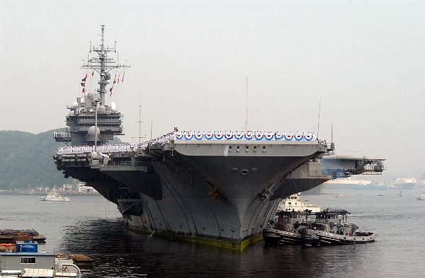 Yokosuka, Japan (May 6, 2003) -- USS Kitty Hawk (CV 63) returns to Yokosuka, Japan from her deployment to the Arabian Gulf. 
Yokosuka, Japan (May 6, 2003) -- USS Kitty Hawk (CV 63) returns to Yokosuka, Japan from her deployment to the Arabian Gulf. The Kitty Hawk Carrier Strike Group participated in Operations Southern Watch and Iraqi Freedom. Operation Iraqi Freedom is the multi-national coalition effort to liberate the Iraqi people, eliminate Iraq's weapons of mass destruction and end the regime of Saddam Hussein. U.S. Navy photo by Photographer's Mate 1st Class David A. Levy. (RELEASED)
