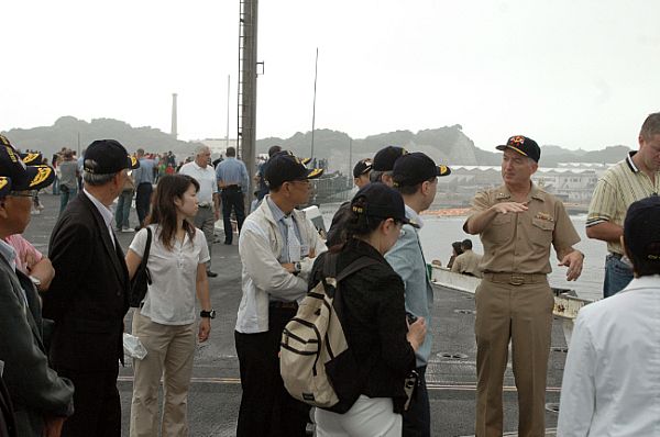 YOKOSUKA, Japan (Sept. 23, 2007) - Rear Adm. Jamie Kelly, commander of Naval Forces Japan, speaks to a tour group aboard USS Kitty Hawk (CV 63) during a Friends and Family Cruise.
YOKOSUKA, Japan (Sept. 23, 2007) - Rear Adm. Jamie Kelly, commander of Naval Forces Japan, speaks to a tour group aboard USS Kitty Hawk (CV 63) during a Friends and Family Cruise. Kitty Hawk brought aboard more than 2,200 American and Japanese guests for a day cruise, which included an air demonstration and shipboard tours. U.S. Navy photo by Mass Communication Specialist 3rd Class Dylan Butler (RELEASED)

