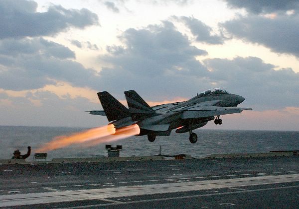 At sea aboard USS Kitty Hawk (CV 63) Nov. 14, 2002 -- An F-14 “Tomcat” assigned to the “Black Knights” of Fighter Squadron One Five Four (VF-154) launches past steaming catapults on the bow of the ship.
At sea aboard USS Kitty Hawk (CV 63) Nov. 14, 2002 -- An F-14 “Tomcat” assigned to the “Black Knights” of Fighter Squadron One Five Four (VF-154) launches past steaming catapults on the bow of the ship. After an aircraft launches, steam is released as catapult pressure subsides. Kitty Hawk is the Navy’s only permanently forward-deployed aircraft carrier and operates out of Yokosuka, Japan. U.S. Navy photo by Photographer’s Mate 3rd Class Todd Frantom. (RELEASED)
