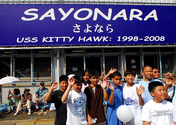 YOKOSUKA, Japan (May 28, 2008) Students from Yokosuka Middle School wave goodbye to the aircraft carrier USS Kitty Hawk (CV 63) as the ship departs Fleet Activities Yokosuka for the last time.
YOKOSUKA, Japan (May 28, 2008) Students from Yokosuka Middle School wave goodbye to the aircraft carrier USS Kitty Hawk (CV 63) as the ship departs Fleet Activities Yokosuka for the last time. Kitty Hawk, the Navy's oldest active warship and only forward-deployed aircraft carrier, will soon be relieved by the Nimitz-class nuclear-powered aircraft carrier USS George Washington (CVN 73). U.S. Navy photo by Mass Communication Specialist 3rd Class Matthew R. White (Released)
