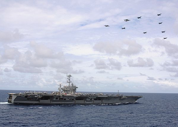 PACIFIC OCEAN (April 20, 2008) Aircraft assigned to Carrier Air Wing (CVW) 17 perform a fly-by maneuver over the nuclear-powered aircraft carrier USS George Washington (CV 73).
PACIFIC OCEAN (April 20, 2008) Aircraft assigned to Carrier Air Wing (CVW) 17 perform a fly-by maneuver over the nuclear-powered aircraft carrier USS George Washington (CV 73) as crew members and distinguished visitors watch from the flight deck. George Washington is en route to Yokosuka, Japan, where she will replace the aircraft carrier USS Kitty Hawk (CV 63). US Navy photo by Mass Communication Specialist 2nd Class Clifford L. H. Davis (Released)
