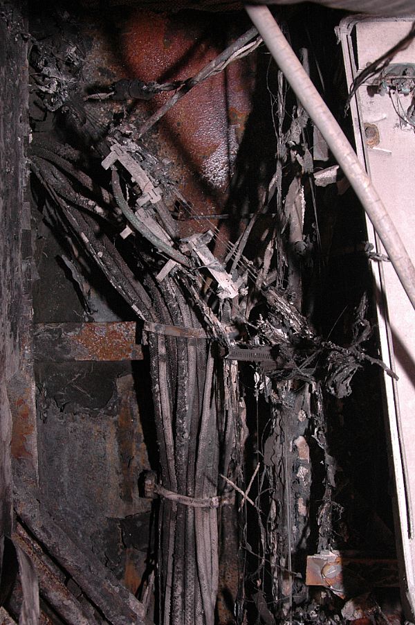 A fire aboard the aircraft carrier USS George Washington (CVN 73) damaged cables near the exhaust and supply ventilation trunk for the auxiliary boiler.
SAN DIEGO (May 29, 2008) A fire aboard the aircraft carrier USS George Washington (CVN 73) damaged cables near the exhaust and supply ventilation trunk for the auxiliary boiler. George Washington is in San Diego for damage assessment and repairs following an at sea fire on May 22. U.S. Navy photo by Mass Communication Specialist 2nd Class Ted Green (Released)
