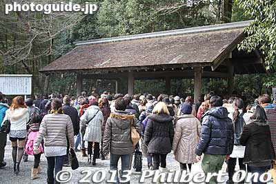 Water fountain where you wash your hands and rinse your mouth for purification. 手水舎
Keywords: mie ise jingu shrine shinto hatsumode new year&#039;s day shogatsu worshippers
