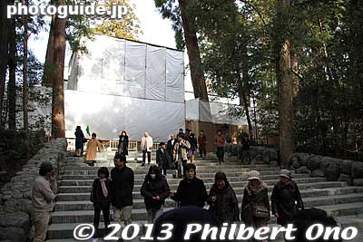 This is the steps leading to the new Naiku shrine that will be completed this fall 2013. The shrine buildings are already close to completion, but they are covered up.
Keywords: mie ise jingu shrine shinto hatsumode new year&#039;s day shogatsu worshippers