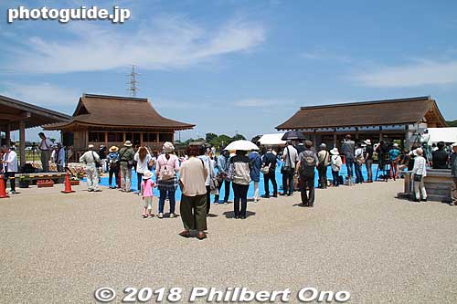 On the second day, the Departure Ceremony is held here at the Saiku Heian-no-mori Park where a few Heian Period structures have been reconstructed. They had a large blue tarp on the ground for spectators.
Second day is the main event. There's the Departure Ceremony and Saio Gunko Procession. The Departure Ceremony reenacts the Saio's departure from Kyoto for her journey to Saiku Palace.
At 1 pm, the Departure Ceremony is held at Saiku Heian-no-mori Park where a few Heian-Period buildings have been reconstructed. At 2 pm, the 120 people dressed in Heian-Period costumes walk in a colorful procession called the "Saio Gunko" to an outdoor stage near the Saiku History Museum. The Saio princesses are carried in their own palanquins. It's a short walk.
On the outdoor stage, they hold a ceremony and picture-taking session from 2:45 pm. Everything ends by 3:30 pm. I went to see the festival on the second day on June 3, 2018. In the case of rain, the event will be canceled.
If you want to get close, you need to arrive earlier than the 1 pm starting time. Short walk from Saiku Station.
Keywords: mie meiwa saiku saio matsuri festival