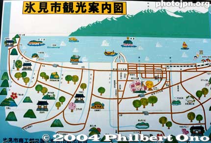 Sightseeing Map
観光案内図 - You will often find a large sightseeing map right outside the train station. At the top, the last four kanji characters read "Kankō Annai-zu" meaning sightseeing guide map. Such maps are inexact and you cannot tell how far things are. The first three characters is the name of the city (Himi-shi).

Place: Himi, Toyama Pref.
