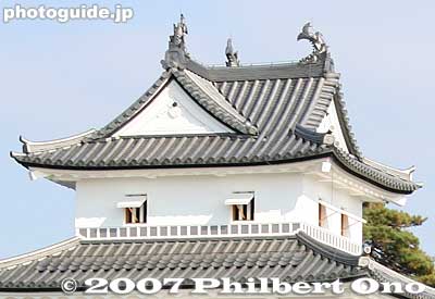 Sangai Yagura Turret with three shachi sculptures on the T-shaped roof. Unique to Shibata Castle. Unfortunately, we cannot enter this turret since it is within the Ground Self-Defence Force base which occupies much of the castle grounds.
Keywords: niigata shibata castle park turret japancastle