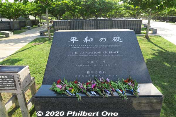 Cornerstone of Peace (平和の礎) in Mabuni, a large oceanfront memorial park full of these stone slabs inscribed with over 240,000 names of people who died in the battle. 
Keywords: okinawa itoman Cornerstone of Peace war memorial monument