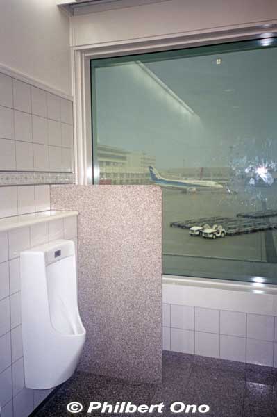 Urinal with a view at the men's restroom at Naha's departure gates. This photo was taken on a previous trip to Okinawa. The window was transparent.
Keywords: okinawa naha airport