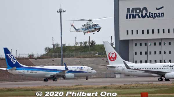 Helicopter landing in Naha.
Keywords: okinawa naha airport boeing 737 plane