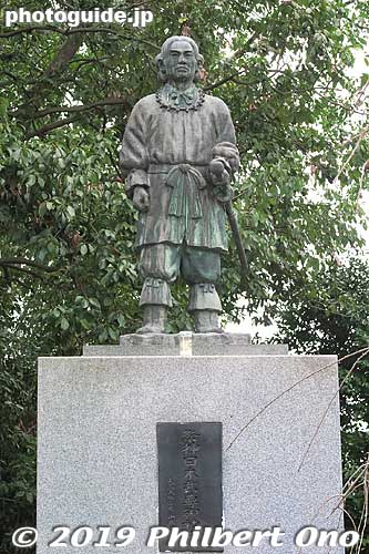 This is a statue of Yamato Takeru (日本武尊) at Otori Taisha. He went around Japan and defeated his enemies until he finally met his demise on Mt. Ibuki in Shiga Prefecture where sought to kill an evil god. 
This god disguised himself as a white boar (another version says it was a serpent) who sprayed a poisonous mist that sickened Yamato Takeru.

He eventually died and when his body was cremated and buried in Kameyama in Mie Prefecture, his spirit rose from the ashes as a great white bird. This bird landed in a few places before finally landing here in Sakai, Osaka, where this Otori Shrine was built. "Otori" means "Big Bird" (not like Sesame Street, but more like a great swan or firebird).
Keywords: osaka sakai Otori Taisha Jinja shrine new year hatsumode japansculpture