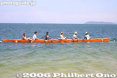 The orange boat. On the left at the ear is the cox, the middle are four rowers, and at the front of the boat is one extra person who can rest and enjoy the ride.
Keywords: shiga lake biwako shuko rowing around