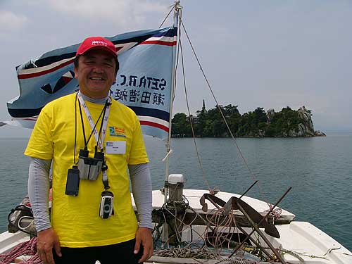 Masaki "Follow Me" Unose on the lead boat going to Takeshima island.
Keywords: shiga hikone takeshima lake biwa fisa world rowing tour biwako lake biwa boats 