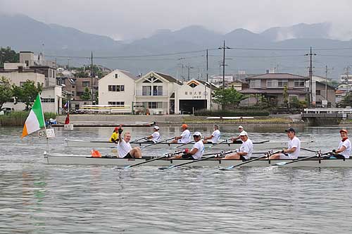 Rowing past the rowing club of Ryukoku University, based in Kyoto.
