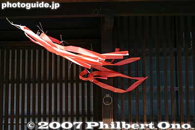 Many homes hang red streamers during the Sagicho Festival.
Keywords: shiga omi-hachiman sagicho matsuri festival float boar