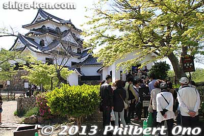 People line up to enter Hikone Castle's main tower.
