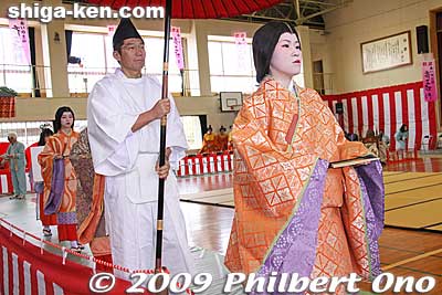 Another Myobu, followed by a man in white who is the Hakucho (白丁), a guide and guard of the court ladies. 
Keywords: shiga koka tsuchiyama saio princess procession kimono women matsuri festival 