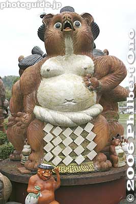 Giant tanuki dressed as a Yokozuna grand champion sumo wrestler.
Keywords: shiga koka shigaraki pottery tanuki raccoon dog dolls sculpture
