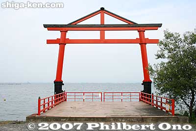 Hiyoshi Taisha Shrine's boat dock is used during the Sanno Festival when they carry the portable mikoshi shrines on a boat.
Keywords: shiga otsu shinto hiyoshi taisha shrine torii lake biwa